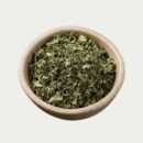 bowl containing bulk crushed leaf kratom as wholesale product